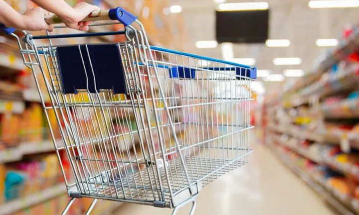 Shopping trolley in a retail aisle